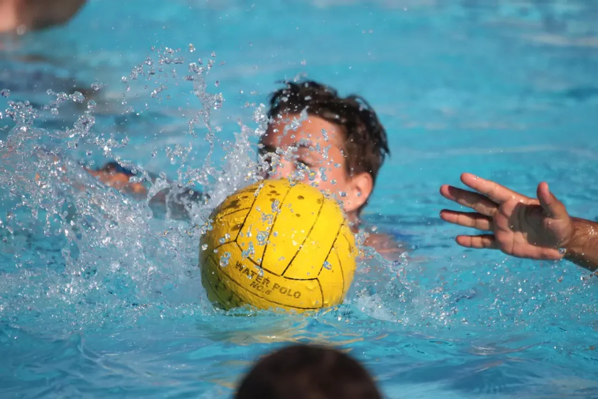 water polo ball in water, boy