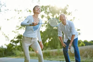 two people playing badminton, badminton rules for doubles