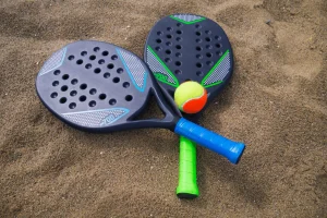 beach-tennis-racquets-in-sand-beach-tennis-ball, tennis equipment