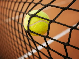 tennis-ball-hitting-net