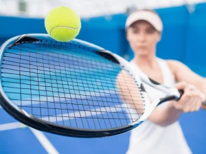 women-hitting-tennis-ball